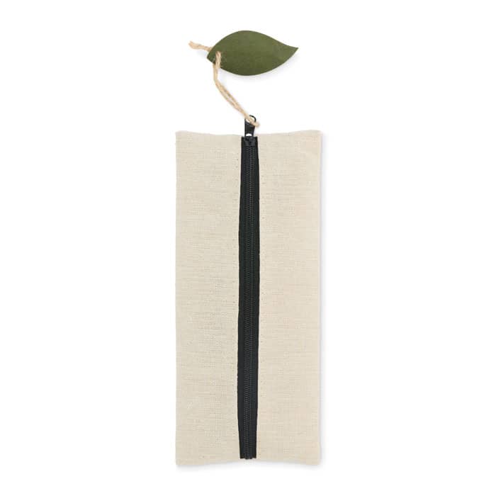 A beige zipper pouch with a green leaf accent on top. It has a black zipper down the centre.