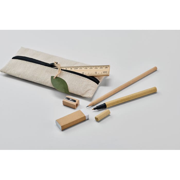 A stationery set featuring a natural fabric pencil case, wooden pencils, a ruler, sharpener, and eraser on a white background.