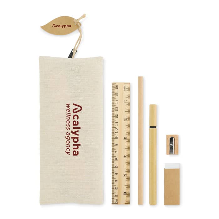 A natural fabric pouch containing a ruler, pencil, sharpener, and eraser. The pouch features a logo.