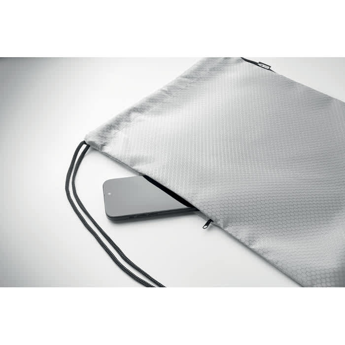 A grey pouch bag with a drawstring, revealing part of a smartphone inside. It has a simple, sleek design.