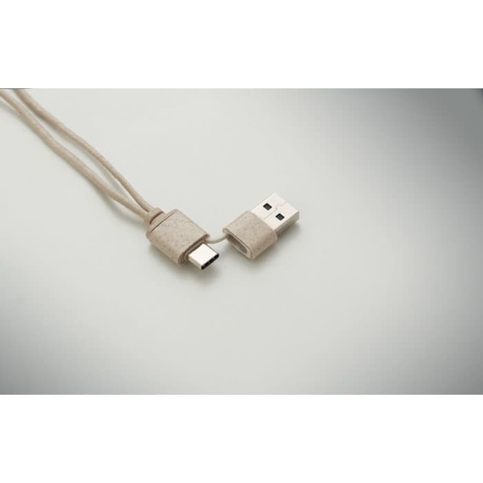 A charging cable with beige fabric covering, featuring USB and USB-C connectors on either end.