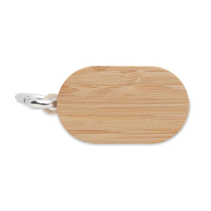 A bamboo keychain with a silver clasp, featuring a smooth, oval surface. It has branding visible on the product.