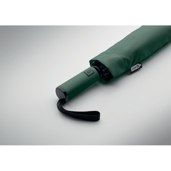 A green umbrella with a black handle, featuring a logo on the fabric cover.