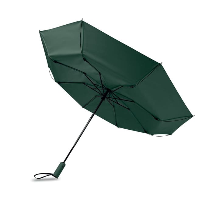 A green umbrella with a black handle, featuring a compact design and a sturdy frame. It has a logo on the handle.