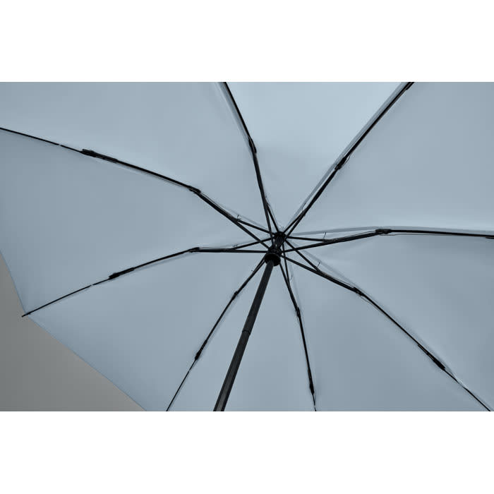 A light blue umbrella with a black frame, showcasing the interior structure and ribbing.