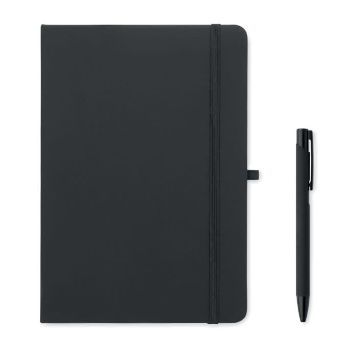 A black notebook with a pen beside it. The notebook has an elastic band and a ribbon bookmark.