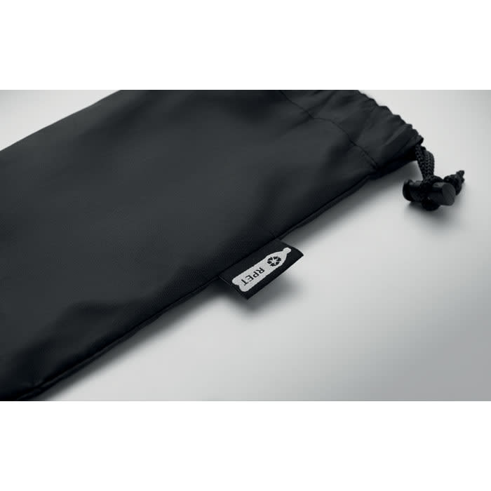 A black drawstring pouch with a logo tag attached to the side.