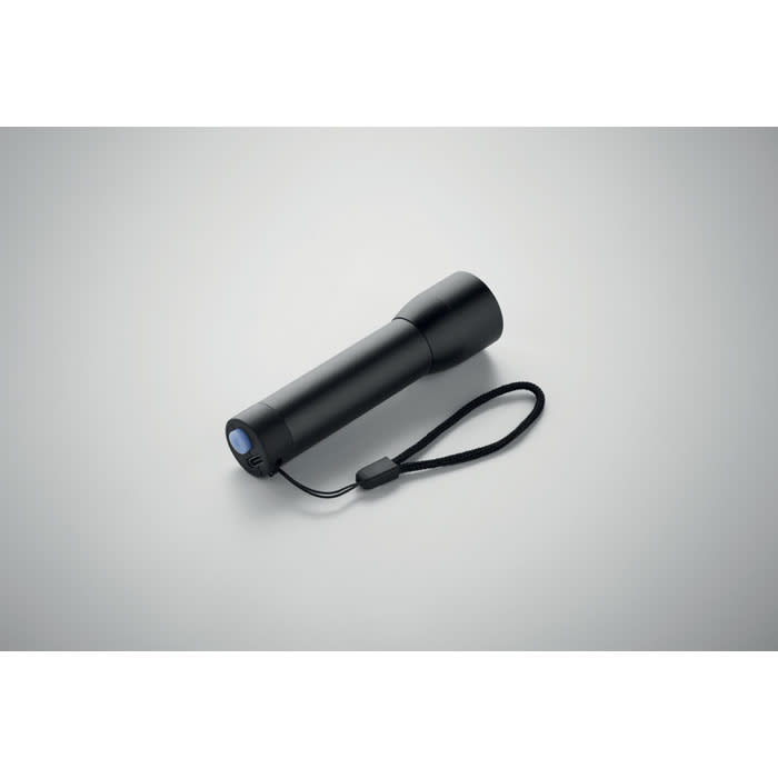 A black flashlight with a wrist strap, featuring a simple cylindrical design and a blue light at the end.