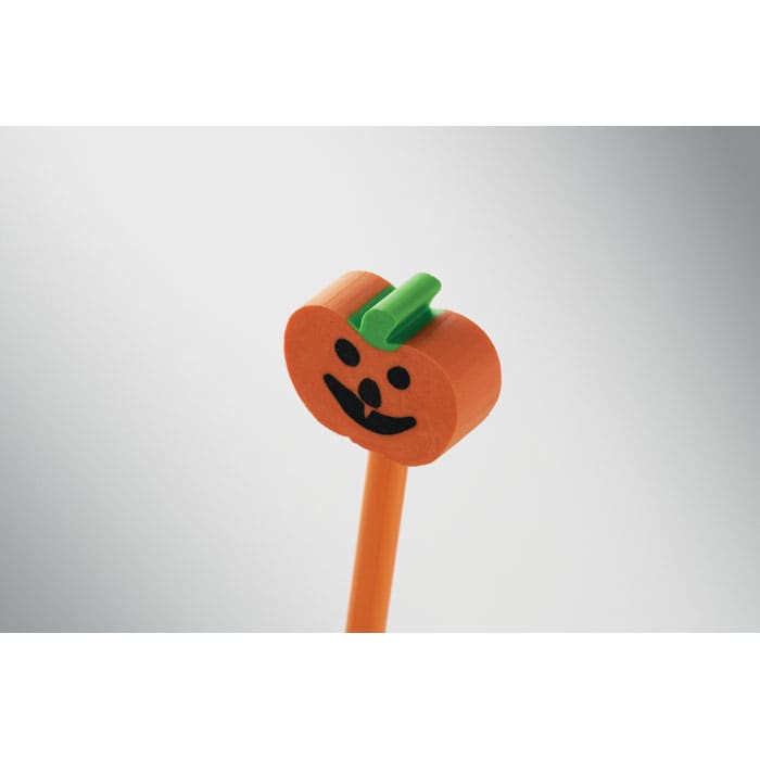 An orange pumpkin-shaped pen with a green stalk and a smiling face design.