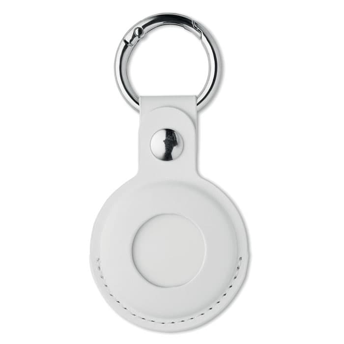 A white keychain with a circular design, featuring a metal ring for attachment and stitching detail around the edge.