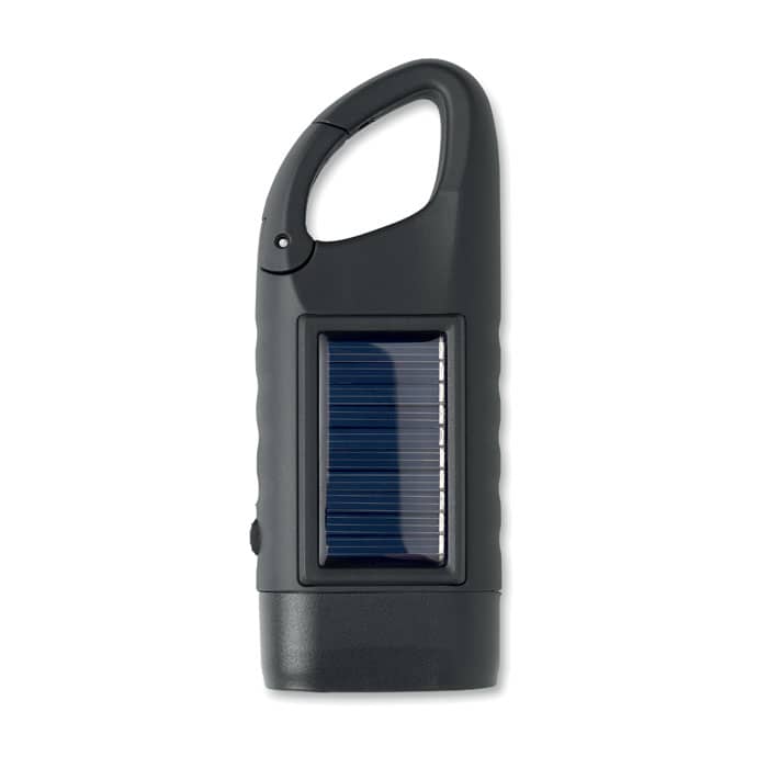 A portable black solar lantern with a handle and a solar panel on the front.