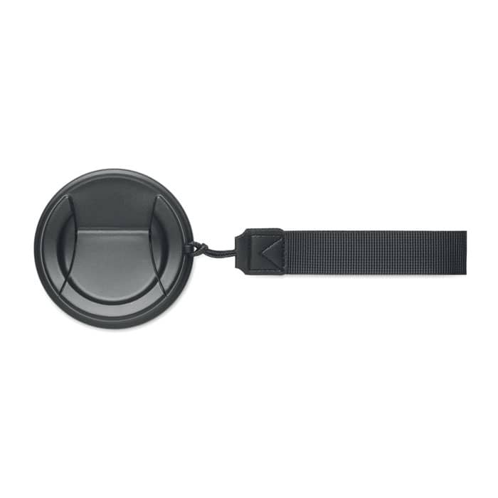 A drink bottle cap in black, featuring a strap for easy carrying. It has a circular design with a smooth surface.