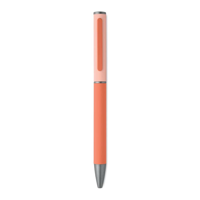 A pen with a coral body and a light pink clip, featuring a silver trim and sleek design.