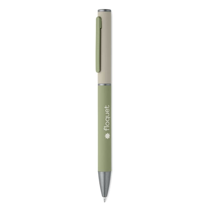 A pen with a green body and cream grip, featuring a logo on the barrel.
