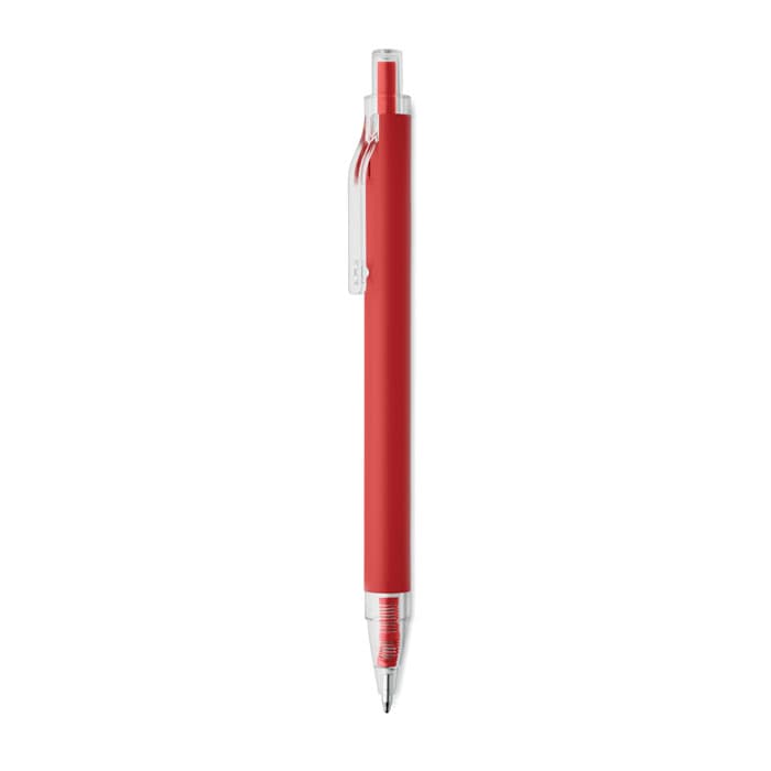 A red ballpoint pen with a transparent clip and a silver nib. The pen features a simple and sleek design.
