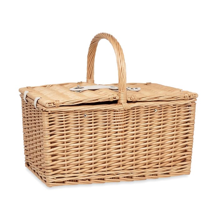 A wicker picnic basket with a woven design and a sturdy handle, featuring a secured lid.