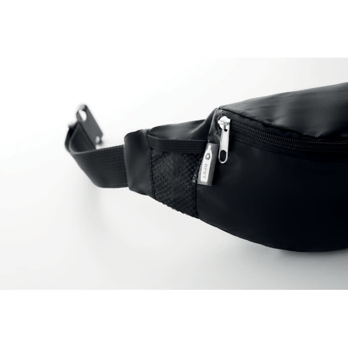 A black waist bag with a zippered pocket and a mesh section, featuring a metal zipper pull and adjustable strap.