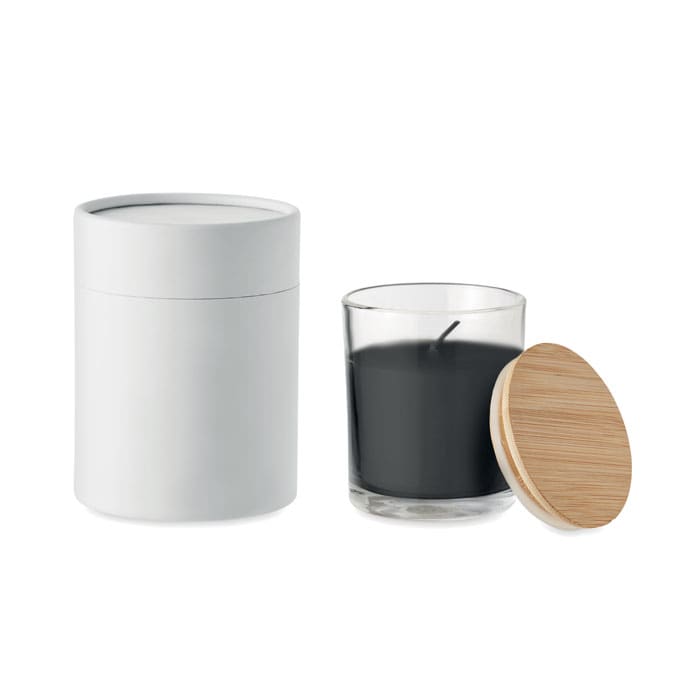 A candle set featuring a black candle in a glass container and a cylindrical white container with a wooden lid.