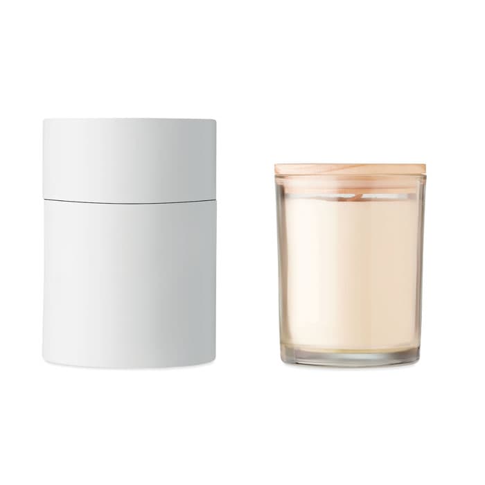 A white cylindrical container beside a clear glass candle with a wooden lid, featuring a light-coloured wax.