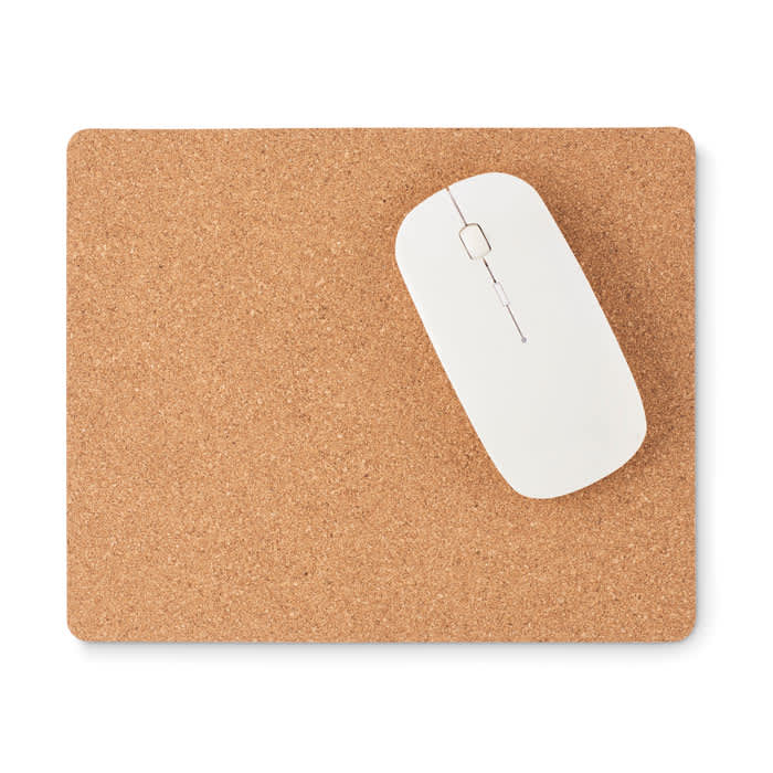 A mouse pad made of cork with a white computer mouse positioned on it.