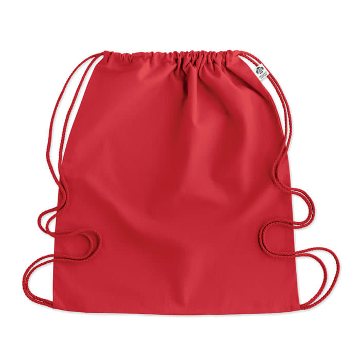 A drawstring bag in vibrant red with matching red cords, featuring a simple, smooth design.