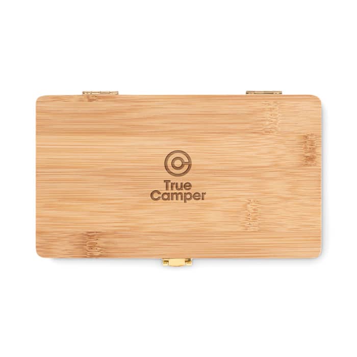 A bamboo wooden box with a golden clasp and a logo design. The surface is smooth and natural in appearance.