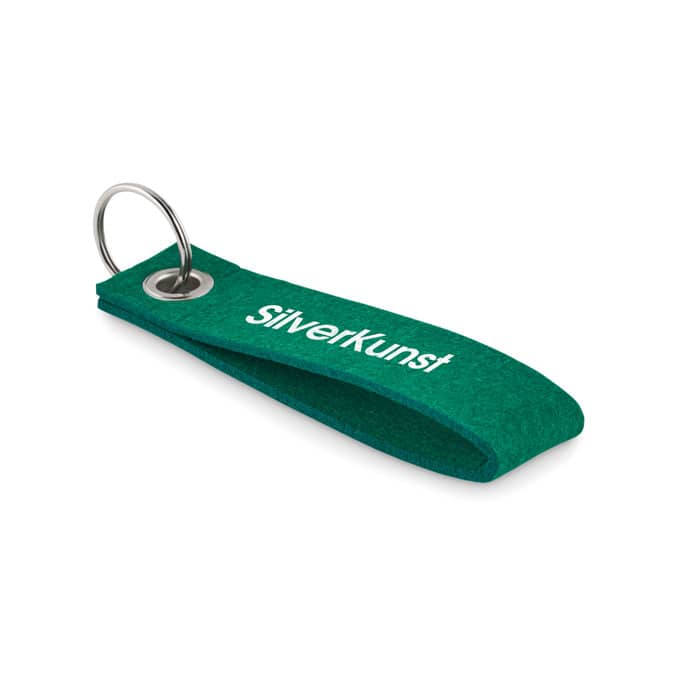 A key ring made of green fabric with a metal ring, featuring a logo on one side.