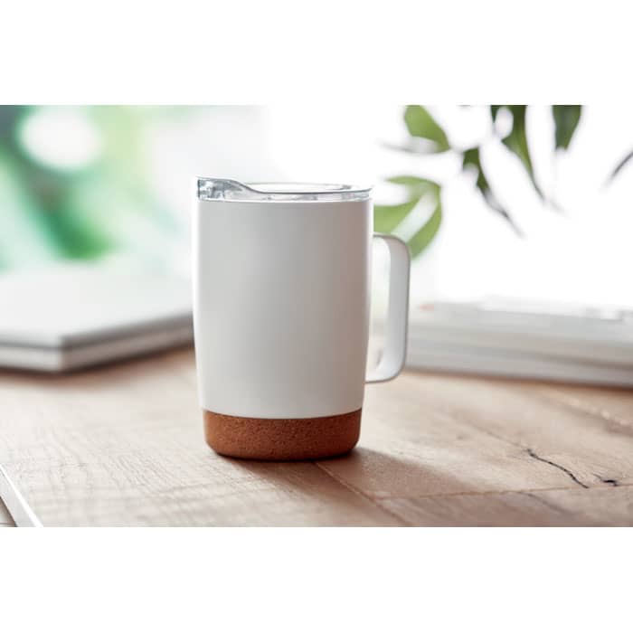 A drink bottle in white with a cork base, featuring a clear lid and a handle, set on a wooden surface.