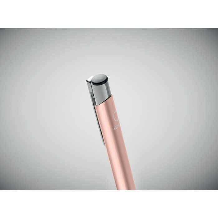 A pen with a sleek design featuring a pink body and a silver accent, alongside a logo.