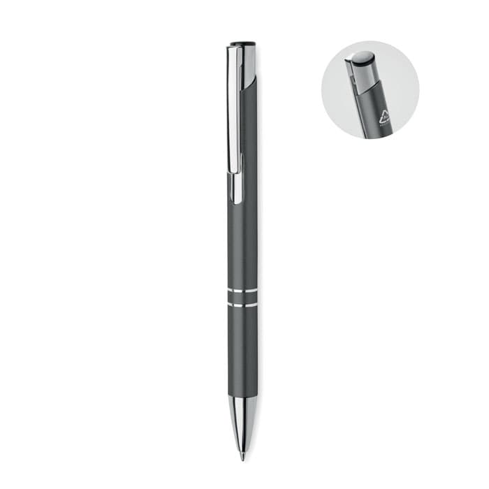 A pen in dark grey with silver accents and a click mechanism. It features a logo on the barrel.