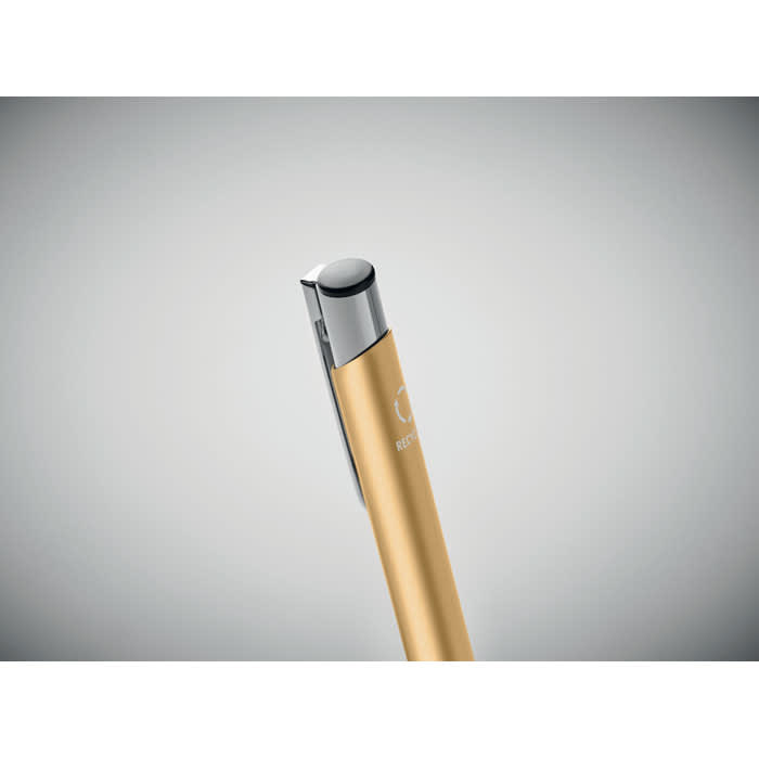 A pen with a gold barrel and silver accents, featuring a logo on the side.