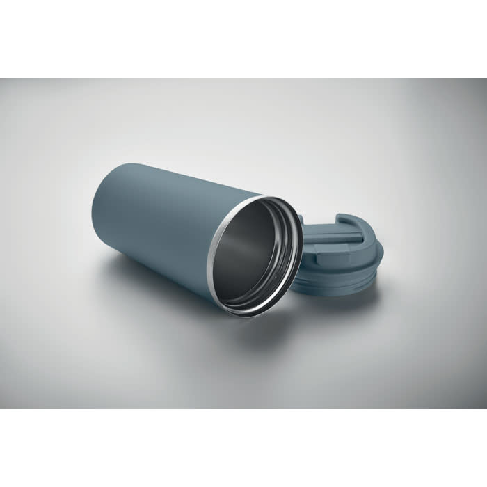 A drink bottle in a matte blue finish with a silver interior and a screw-on lid, featuring a logo on the side.
