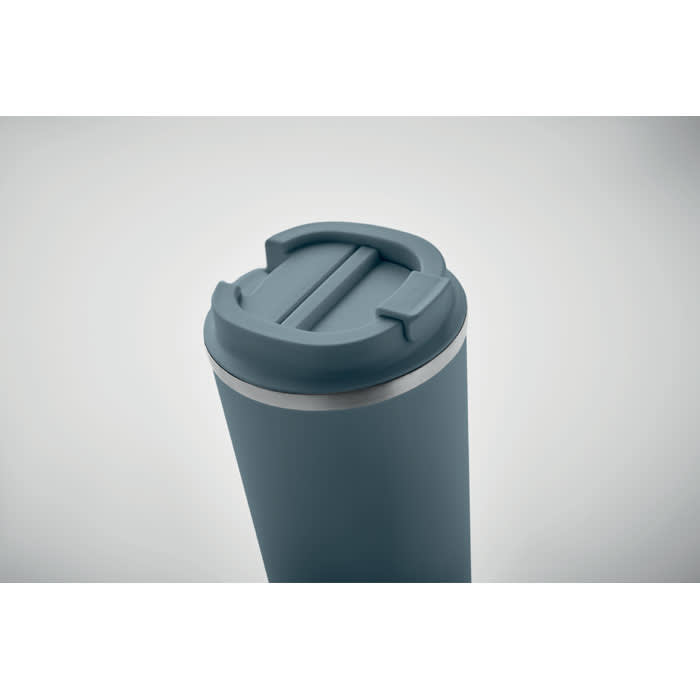 A drink bottle in a muted blue colour with a grey, textured lid featuring a sliding opening. Brand logo present.