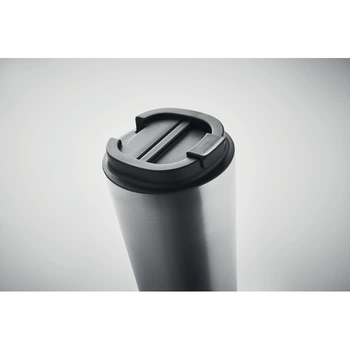 A drink bottle with a sleek silver body and a black lid featuring a sliding mechanism.