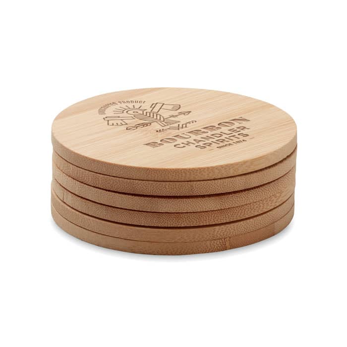A set of four round bamboo coasters stacked together, featuring a logo on the top coaster.