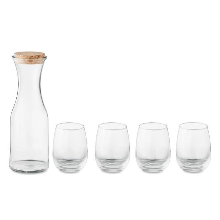 A drink bottle and four matching glass tumblers, all made of clear glass with a cork top on the bottle.