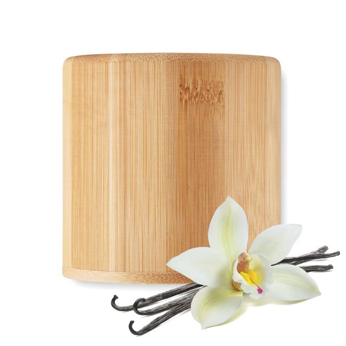A bamboo container featuring a vanilla orchid flower and vanilla pods, with a natural, earthy colour palette.