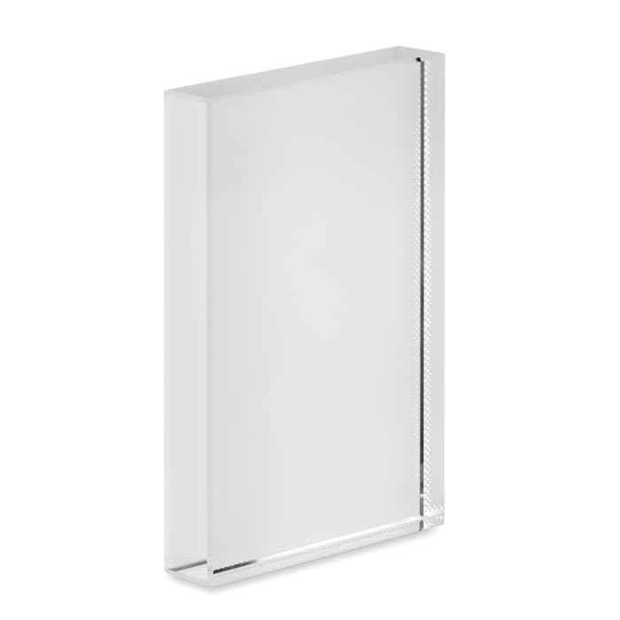 A transparent acrylic block with a smooth surface and a simple rectangular shape. It features polished edges.