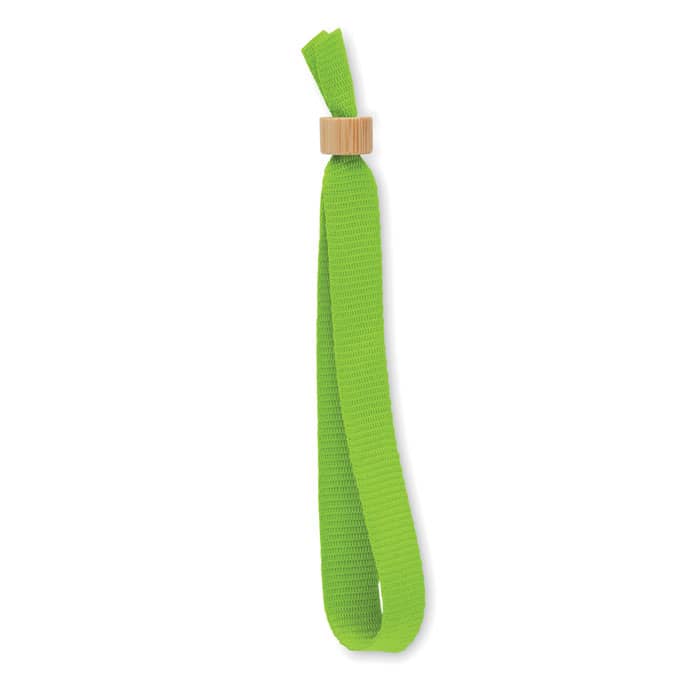 A green drink bottle holder features a bamboo accent and a loop for convenience.