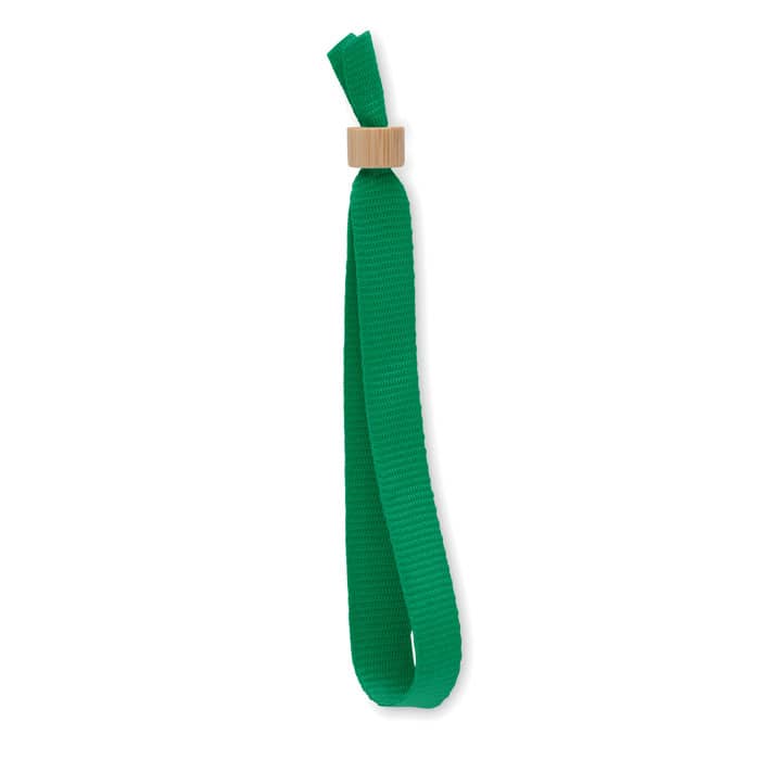 A green ribbon with a wooden slide bead for adjustment. Simple and elegant design.