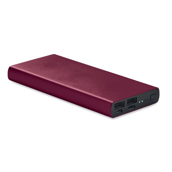 A power bank in deep red with multiple USB ports and a logo.