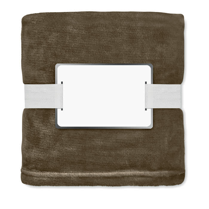 A soft, brown fleece blanket wrapped with a white band and a blank label in the centre.