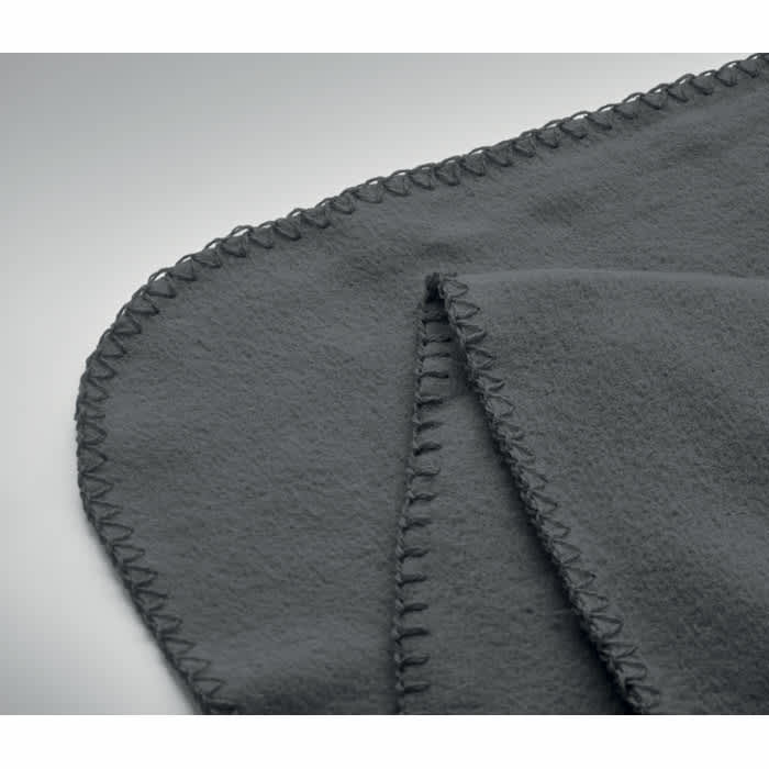A grey fleece blanket with stitched edges, folded to display its soft texture and neat finish.