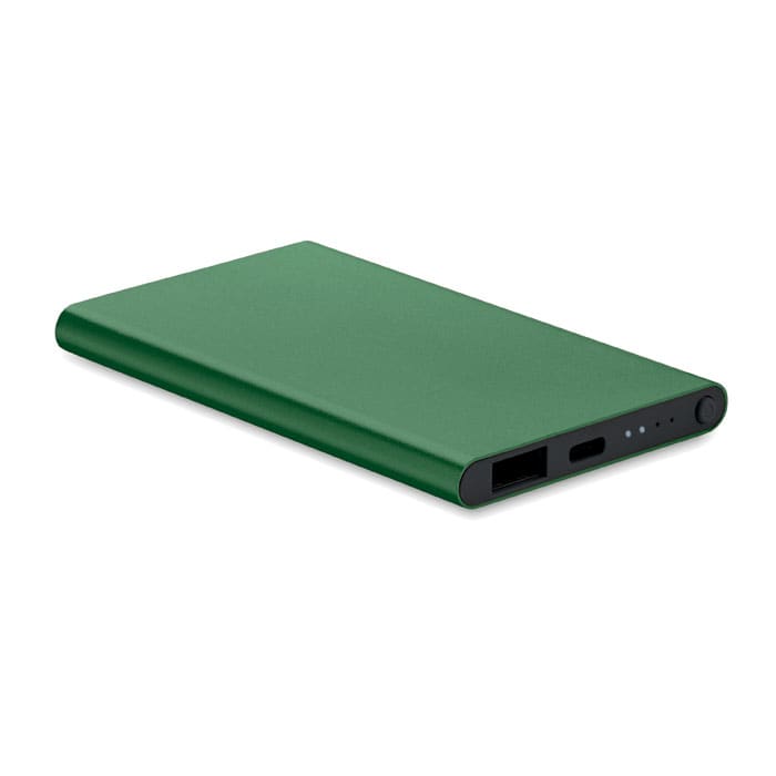 A green portable power bank with a black edge and charging ports, featuring a logo on the side.