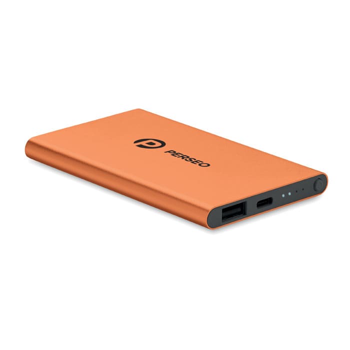 A power bank in vibrant orange with a black border and logo, featuring USB ports and indicator lights.