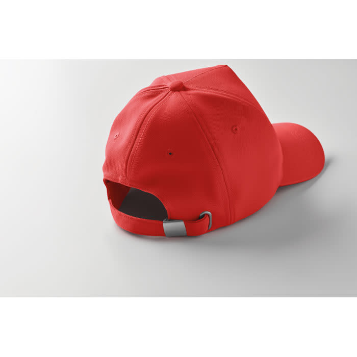 A red cap with an adjustable strap at the back, displayed from a rear angle.