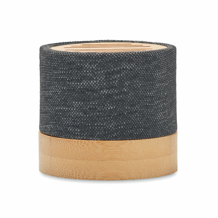 A drink bottle featuring a textured dark grey fabric exterior and a natural bamboo base, with a logo present.