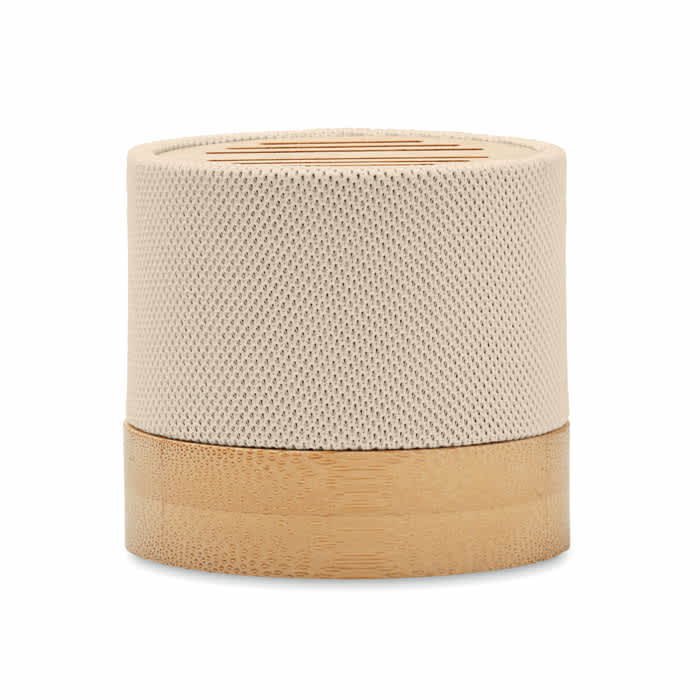 A cylindrical speaker with a beige fabric exterior and a bamboo base, featuring a textured design.