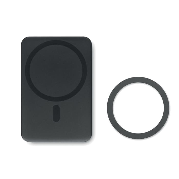 A black rectangular wireless charger with a circular magnetic ring nearby.