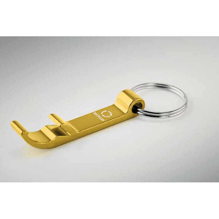 A gold keychain tool with a ring, featuring a hook end for functionality.